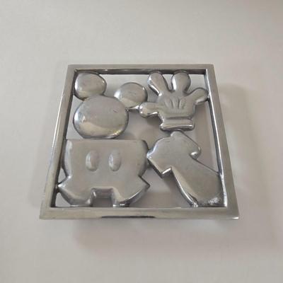 LOT 124B: Mickey Mouse Head Shaped Cutting Board, Metal Trivet, Bowls with Mickey's Feet, Minnie Mouse Cup and Saucer, and Minnie...