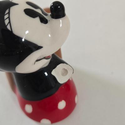 LOT 124B: Mickey Mouse Head Shaped Cutting Board, Metal Trivet, Bowls with Mickey's Feet, Minnie Mouse Cup and Saucer, and Minnie...