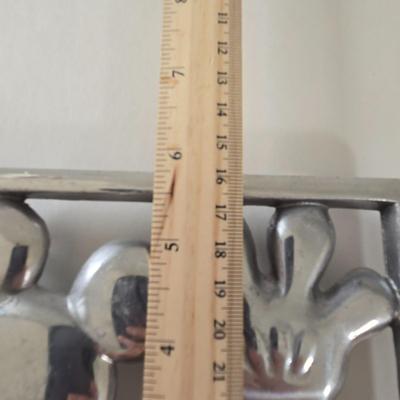 LOT 124B: Mickey Mouse Head Shaped Cutting Board, Metal Trivet, Bowls with Mickey's Feet, Minnie Mouse Cup and Saucer, and Minnie...