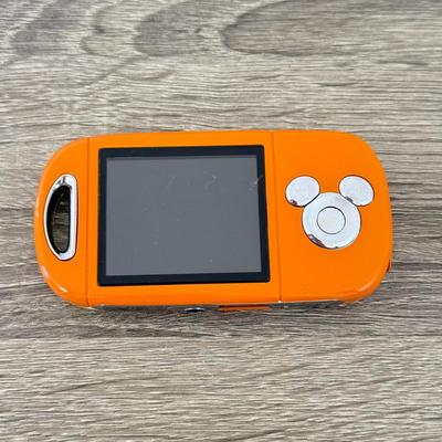 LOT 144L: Disney Mix Max Digital Music Player (Orange High School Musical) w/ 7 "Tapes" & Dock Model D9-15-950