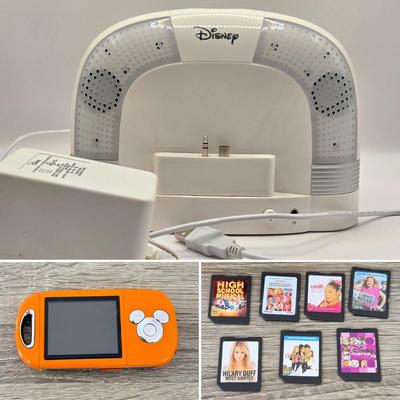 LOT 144L: Disney Mix Max Digital Music Player (Orange High School Musical) w/ 7 "Tapes" & Dock Model D9-15-950