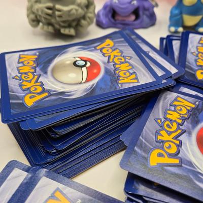 LOT 145L: Pokemon Cards & Toys
