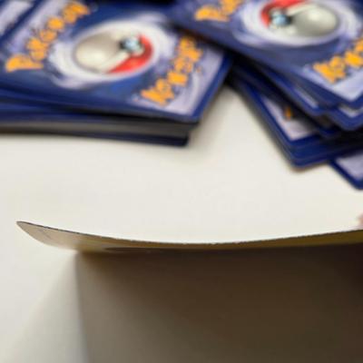 LOT 145L: Pokemon Cards & Toys