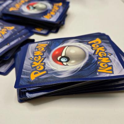 LOT 145L: Pokemon Cards & Toys