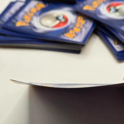 LOT 145L: Pokemon Cards & Toys