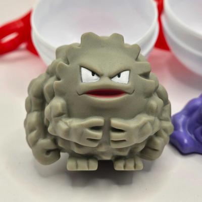 LOT 145L: Pokemon Cards & Toys