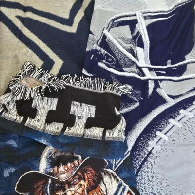LOT 147B: Three Dallas Cowboy Blankets : The One with the Man on it is 64x46, The One with the Helmet is 58x46, The One with the Star is...