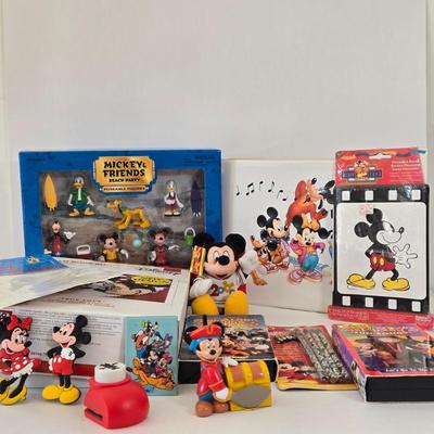 LOT 151L: All Things Disney, Including VHS Tapes, Wall Decal, Latch Hook Rug Kit, Magnets, & More