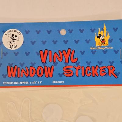 LOT 151L: All Things Disney, Including VHS Tapes, Wall Decal, Latch Hook Rug Kit, Magnets, & More