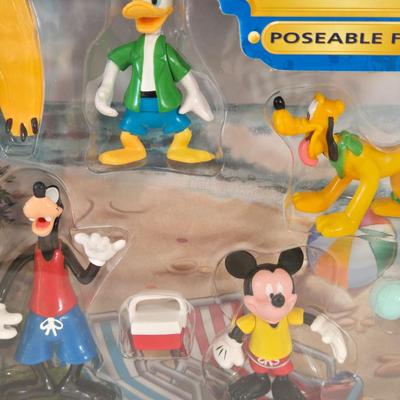 LOT 151L: All Things Disney, Including VHS Tapes, Wall Decal, Latch Hook Rug Kit, Magnets, & More