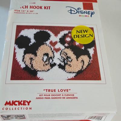 LOT 151L: All Things Disney, Including VHS Tapes, Wall Decal, Latch Hook Rug Kit, Magnets, & More