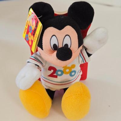 LOT 151L: All Things Disney, Including VHS Tapes, Wall Decal, Latch Hook Rug Kit, Magnets, & More