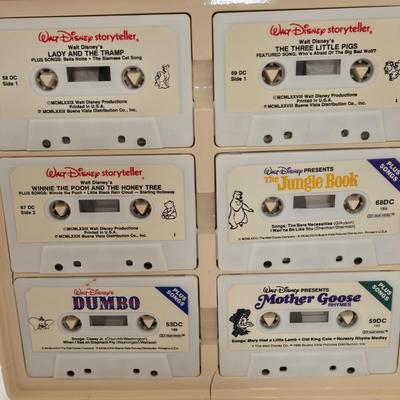 LOT 151L: All Things Disney, Including VHS Tapes, Wall Decal, Latch Hook Rug Kit, Magnets, & More