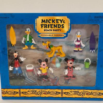 LOT 151L: All Things Disney, Including VHS Tapes, Wall Decal, Latch Hook Rug Kit, Magnets, & More