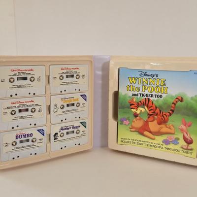 LOT 151L: All Things Disney, Including VHS Tapes, Wall Decal, Latch Hook Rug Kit, Magnets, & More