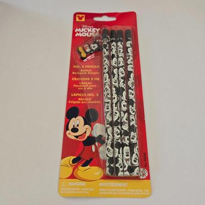 LOT 151L: All Things Disney, Including VHS Tapes, Wall Decal, Latch Hook Rug Kit, Magnets, & More