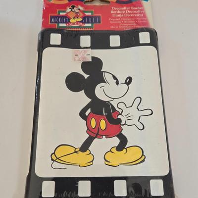 LOT 151L: All Things Disney, Including VHS Tapes, Wall Decal, Latch Hook Rug Kit, Magnets, & More