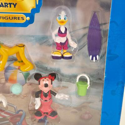 LOT 151L: All Things Disney, Including VHS Tapes, Wall Decal, Latch Hook Rug Kit, Magnets, & More