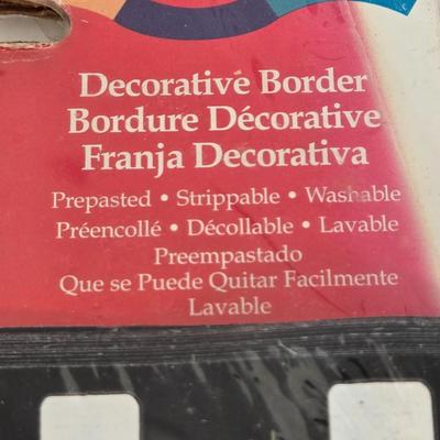 LOT 151L: All Things Disney, Including VHS Tapes, Wall Decal, Latch Hook Rug Kit, Magnets, & More