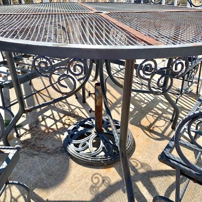 LOT 162 O: Disney's Mickey Mouse Wrought Iron Table w/ 4 Chairs & Black Metal Umbrella Stand