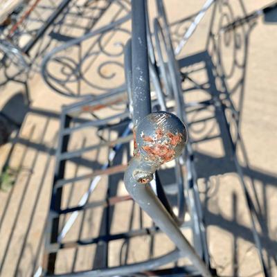 LOT 162 O: Disney's Mickey Mouse Wrought Iron Table w/ 4 Chairs & Black Metal Umbrella Stand