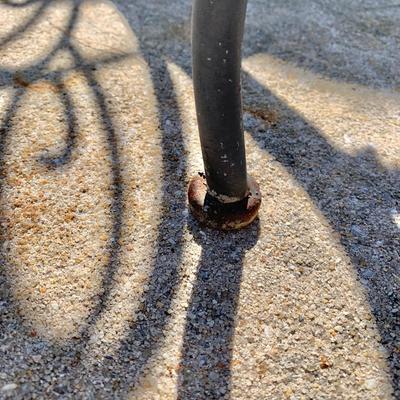 LOT 162 O: Disney's Mickey Mouse Wrought Iron Table w/ 4 Chairs & Black Metal Umbrella Stand