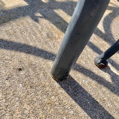 LOT 162 O: Disney's Mickey Mouse Wrought Iron Table w/ 4 Chairs & Black Metal Umbrella Stand