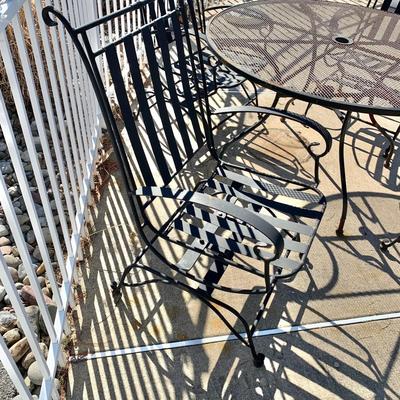 LOT 163 O: Wrought Iron Patio Set; Table & 4 Rocker Chairs