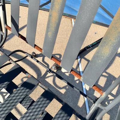 LOT 163 O: Wrought Iron Patio Set; Table & 4 Rocker Chairs