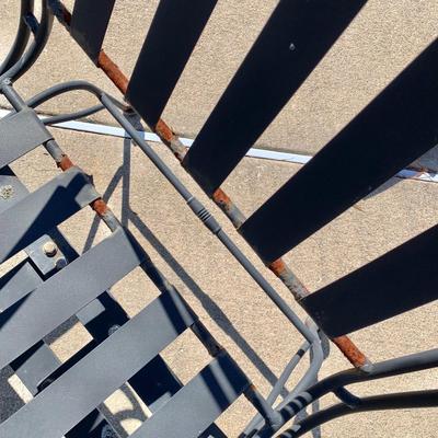 LOT 163 O: Wrought Iron Patio Set; Table & 4 Rocker Chairs