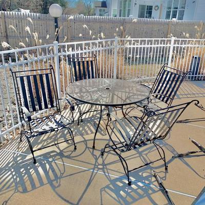 LOT 163 O: Wrought Iron Patio Set; Table & 4 Rocker Chairs