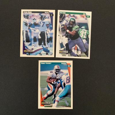 LOT 171 A: NFL Trading Card Collection; Muhsin Muhammad, Carl Pickens, Troy Aikman, Bill Romanowski, Dan Marino, Joe Montana, & More