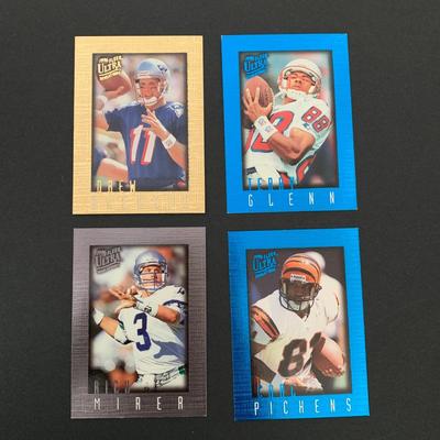 LOT 171 A: NFL Trading Card Collection; Muhsin Muhammad, Carl Pickens, Troy Aikman, Bill Romanowski, Dan Marino, Joe Montana, & More