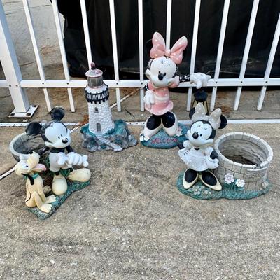 LOT 179 O: Disney's Mickey, Minnie, & Pluto Resin Lawn Decor Collection & Lighthouse