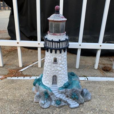 LOT 179 O: Disney's Mickey, Minnie, & Pluto Resin Lawn Decor Collection & Lighthouse