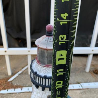 LOT 179 O: Disney's Mickey, Minnie, & Pluto Resin Lawn Decor Collection & Lighthouse