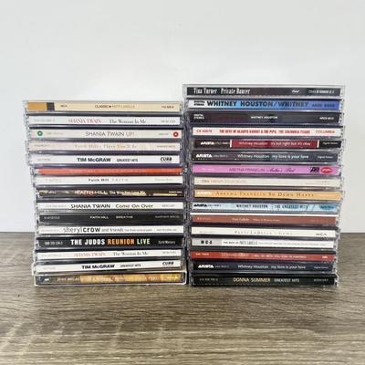 LOT 182B: CD Collection: Dolly Parton, Whitney Houston, Aretha Franklin, Patti LaBelle, Donna Summer, Shania Twain, Faith Hill & More