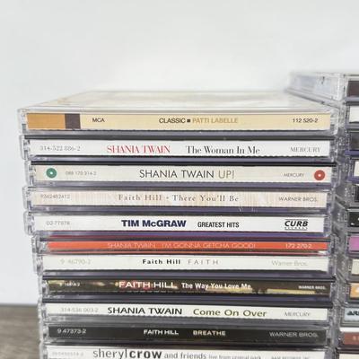 LOT 182B: CD Collection: Dolly Parton, Whitney Houston, Aretha Franklin, Patti LaBelle, Donna Summer, Shania Twain, Faith Hill & More