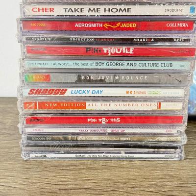 LOT 187B: NIP Britney: The Videos DVD & NIP CDs: Cher, Aerosmith, Bon Jovi, Pink & More