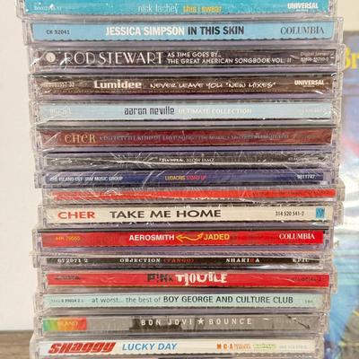 LOT 187B: NIP Britney: The Videos DVD & NIP CDs: Cher, Aerosmith, Bon Jovi, Pink & More