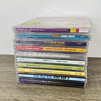 LOT 191A: Kids' CD Collection: NIP Classic Disney CD Box Set, Spongebob & More