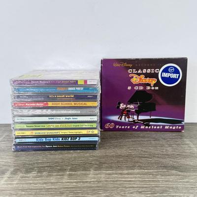 LOT 191A: Kids' CD Collection: NIP Classic Disney CD Box Set, Spongebob & More