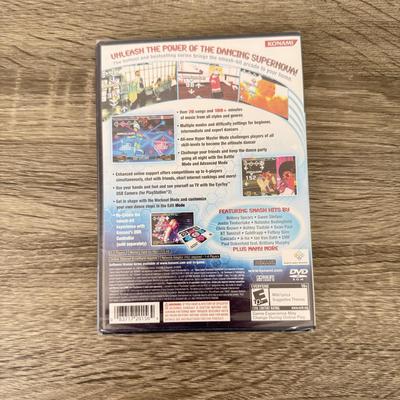 LOT 193A: PlayStation 2 PS2 Video Games: NIP Disney Golf, NIP DDR Super Nova 2, NIP Pac Man World 2, NIP Finding Nemo Game, Disney's...