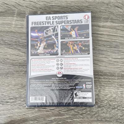 LOT 194B: PlayStation & PS2 Video Games: NIP Austin Powers Pinball, NIP Test Drive Off-Road, NIP NBA Live '06, NIP WWF Smack...