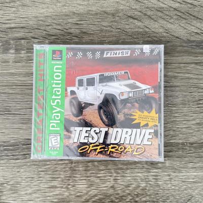 LOT 194B: PlayStation & PS2 Video Games: NIP Austin Powers Pinball, NIP Test Drive Off-Road, NIP NBA Live '06, NIP WWF Smack...