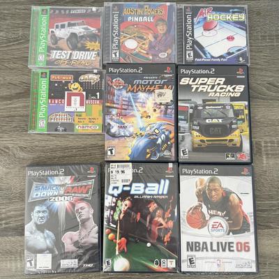 LOT 194B: PlayStation & PS2 Video Games: NIP Austin Powers Pinball, NIP Test Drive Off-Road, NIP NBA Live '06, NIP WWF Smack...