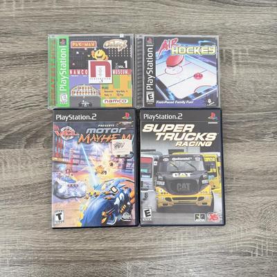 LOT 194B: PlayStation & PS2 Video Games: NIP Austin Powers Pinball, NIP Test Drive Off-Road, NIP NBA Live '06, NIP WWF Smack...