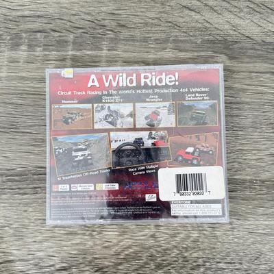 LOT 194B: PlayStation & PS2 Video Games: NIP Austin Powers Pinball, NIP Test Drive Off-Road, NIP NBA Live '06, NIP WWF Smack...