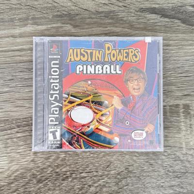 LOT 194B: PlayStation & PS2 Video Games: NIP Austin Powers Pinball, NIP Test Drive Off-Road, NIP NBA Live '06, NIP WWF Smack...