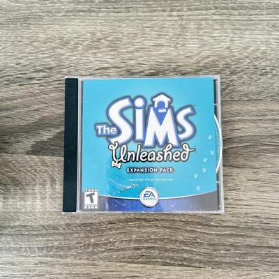 LOT 196B: XBOX Game Case, NIP Oddworld Munch's Oddysee for XBOX & Collection of PC Games: The Sims & More